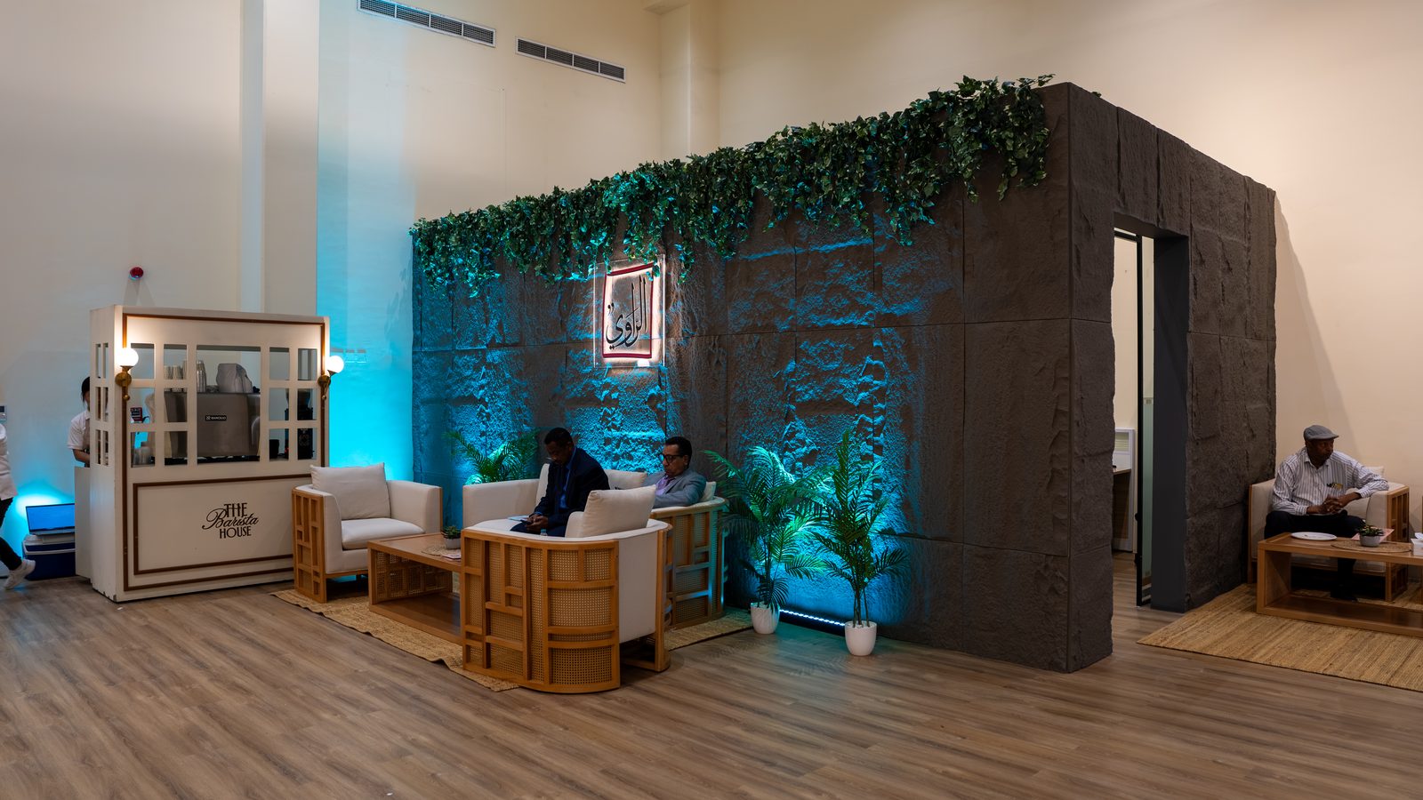 Seating area with green wall at the Sharjah International Narrator Forum 2026